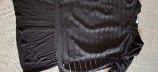 Top trasparente con maglia nera streaching
