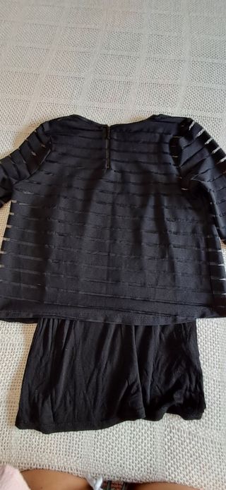 Top trasparente con maglia nera streaching