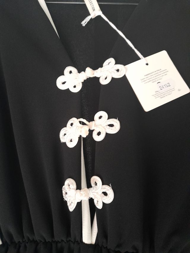 Mono negro crep talla 48 - NUEVO. Pata ancha