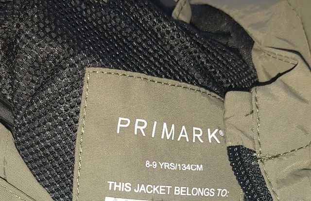 Chubasquero unisex bicolor negra-verde talla 9años