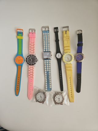 8 relojes de pulsera | Colores varios