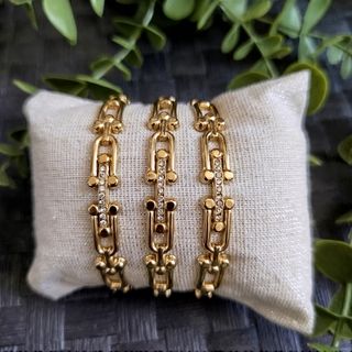 Brazaletes dorados con brillantes