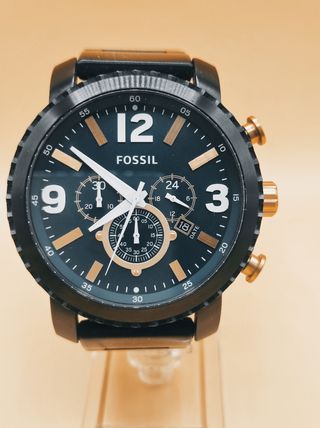 Reloj Fossil negro y dorado