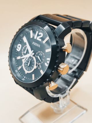 Reloj Fossil negro y dorado