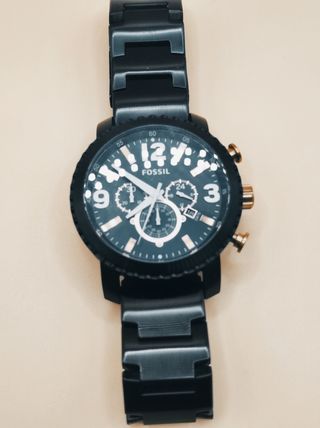 Reloj Fossil negro y dorado