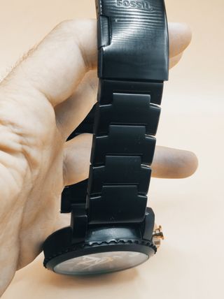 Reloj Fossil negro y dorado