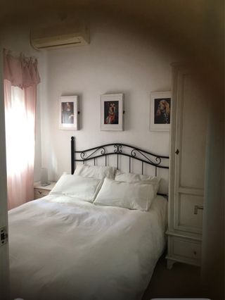Cabecero barrotes hierro negro para cama de 135 cm