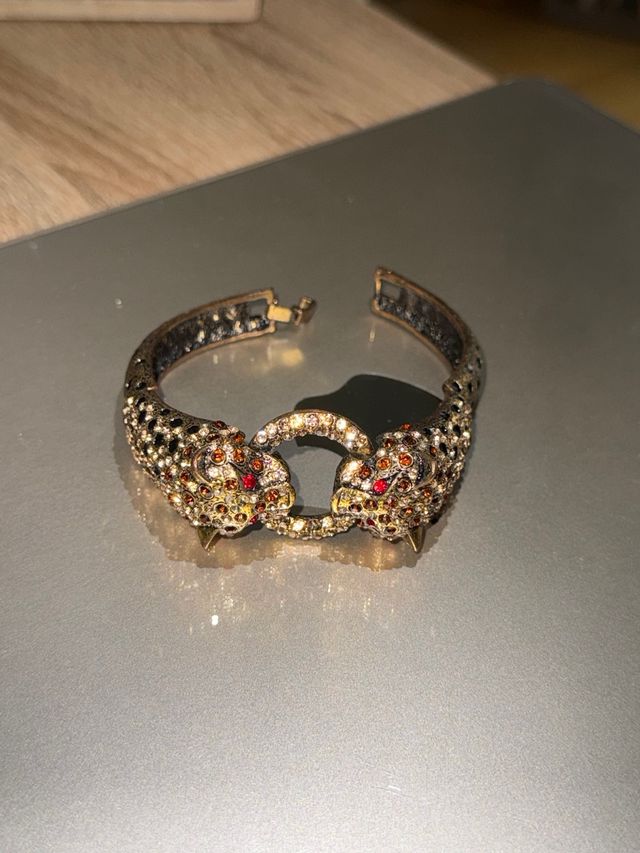 Pulsera jaguar dorada brillante