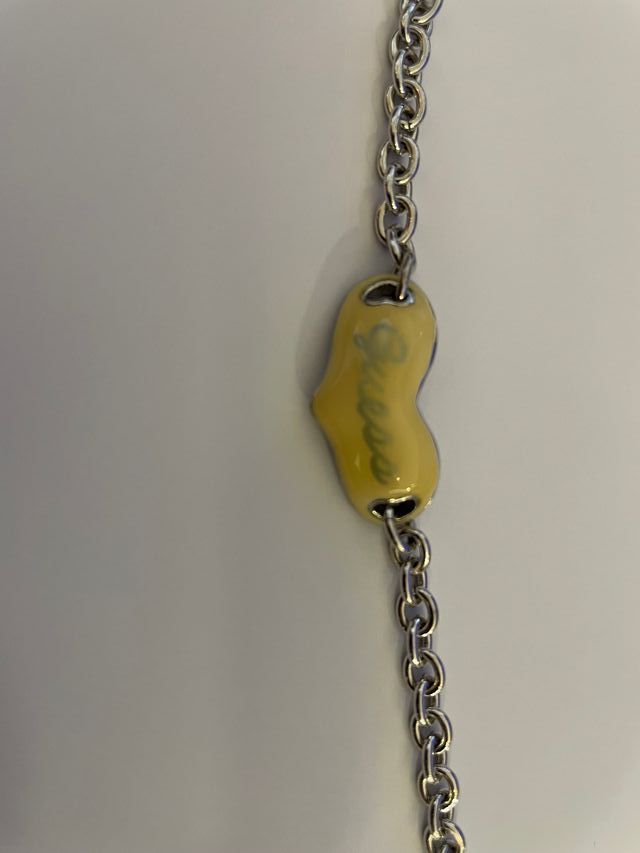 Bracciale Guess cuore giallo