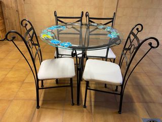 Mesa cristal y 4 sillas hierro forja