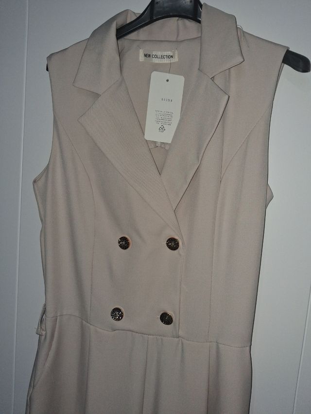 Mono beige S/M, sin estrenar con etiqueta.