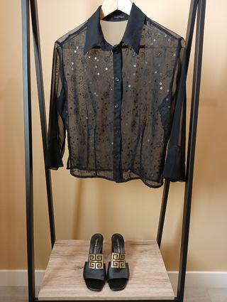 Blusa negra transparente con lentejuelas