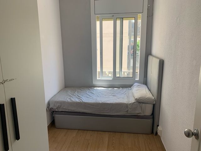 Cama canapé individual gris - cabecero