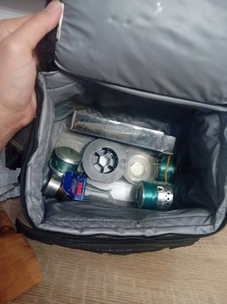 Bolso Geologic lleno de kit de pesca y carrete 