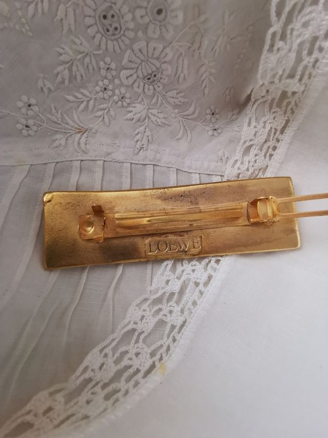 Horquilla para el   pelo Loewe en metal  dorado 