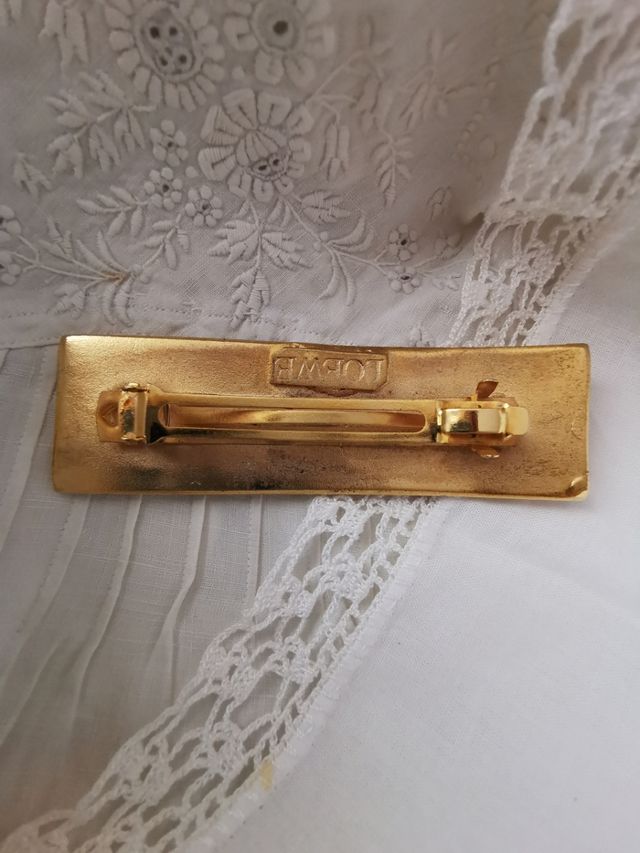 Horquilla para el   pelo Loewe en metal  dorado 