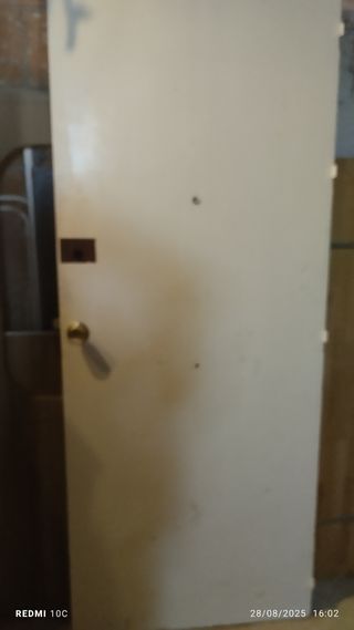 Puerta madera maciza 9 paneles