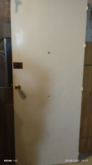 Puerta madera maciza 9 paneles