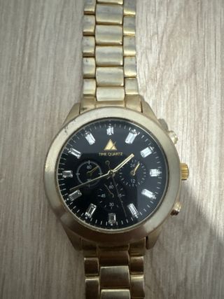 Reloj ASOS dorado y negro