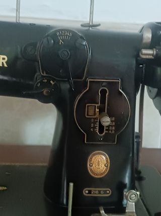 Máquina de coser Singer Antigua