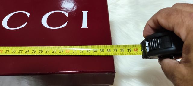 Caja y bolsa Gucci 