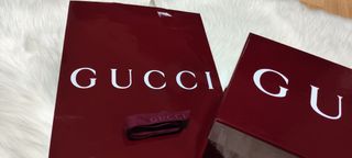 Caja y bolsa Gucci