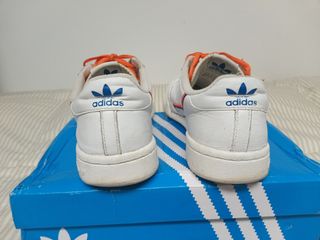 Adidas Continental 80 blancas y naranjas