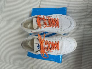 Adidas Continental 80 blancas y naranjas