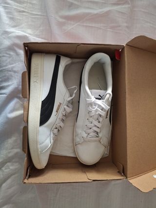Zapatillas Puma blancas y negras
