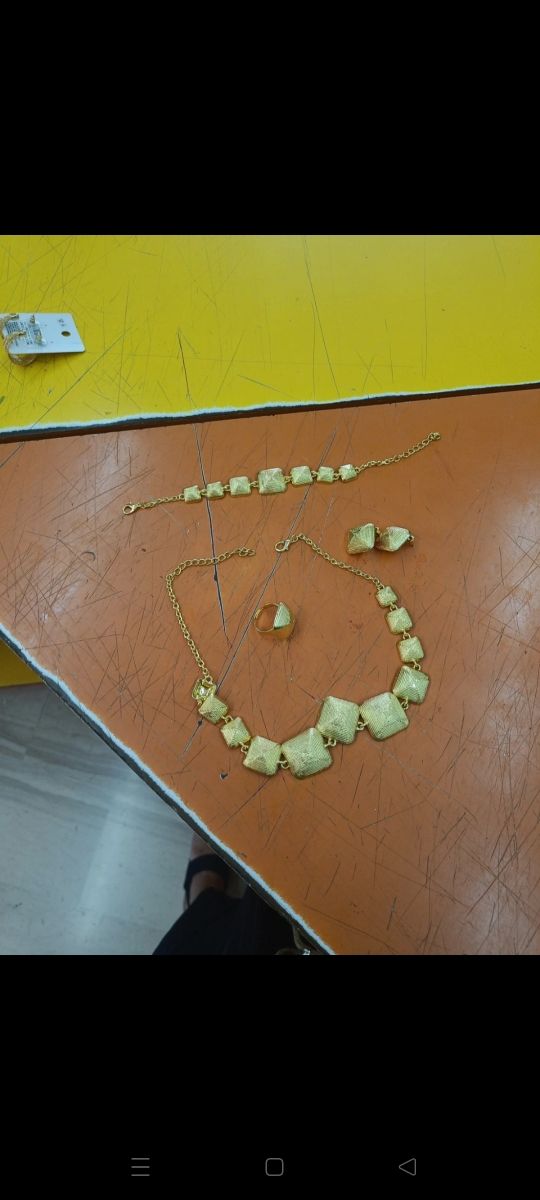 Parure oro | Collana, braccialetto e anelli