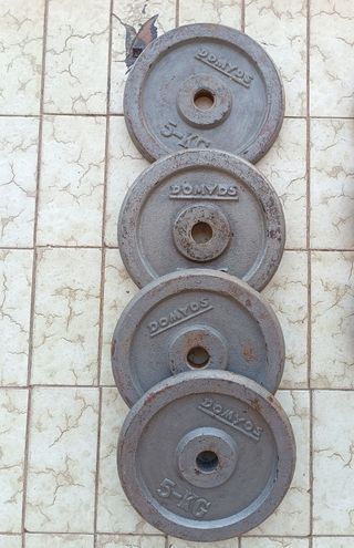 Discos y barra de pesas,material de gym