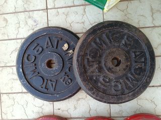 Discos y barra de pesas,material de gym