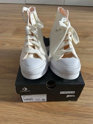 Converse altas blancas y rosas