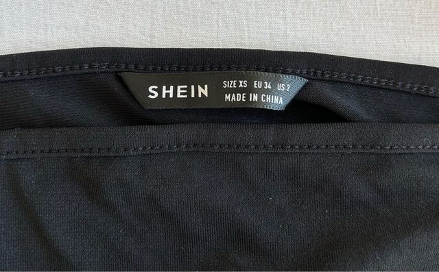 conjunto top y falda color negro NUEVO