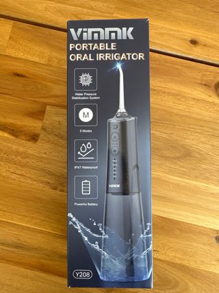 Irrigador oral portatil