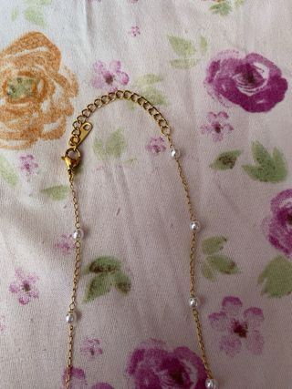 Collar con perla y concha dorada