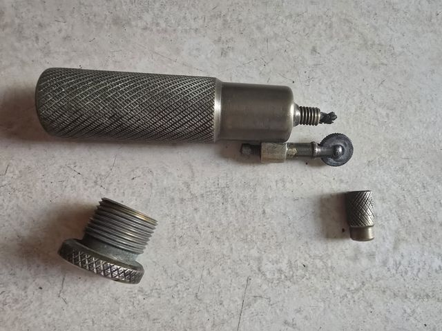 Mechero antiguo bronce