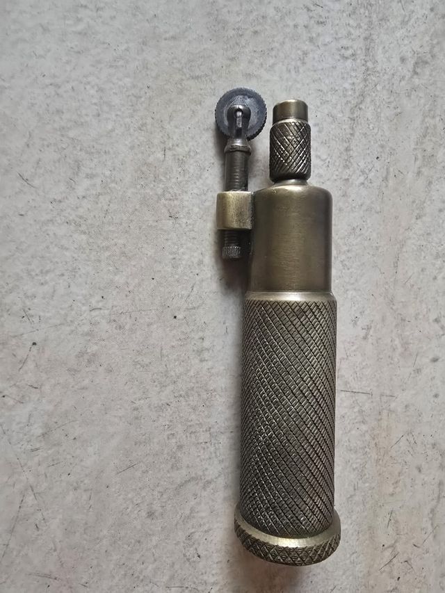 Mechero antiguo bronce