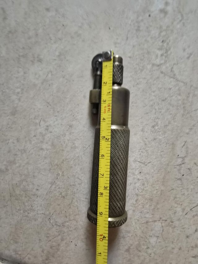 Mechero antiguo bronce