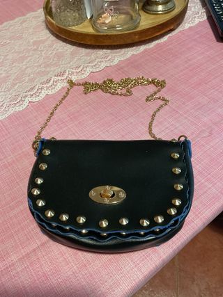 Mini borsa nera con borchie oro