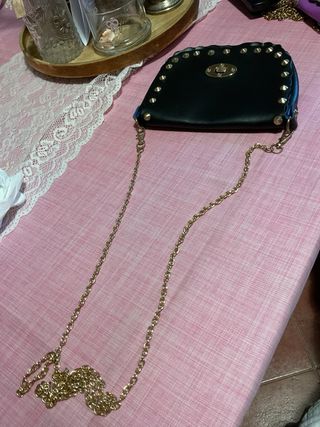 Mini borsa nera con borchie oro