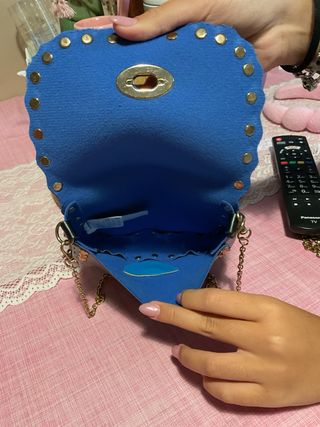 Mini borsa nera con borchie oro
