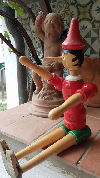 Antico Pinocchio in legno 
