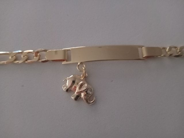 Esclava acero y oro laminado