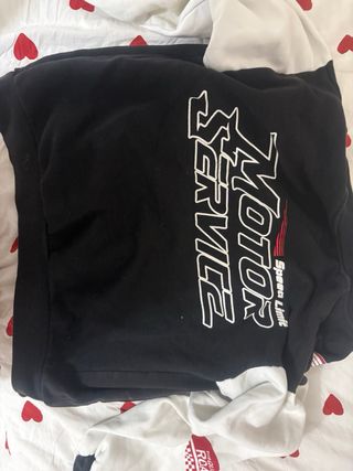 Chaqueta universitaria negra y blanca