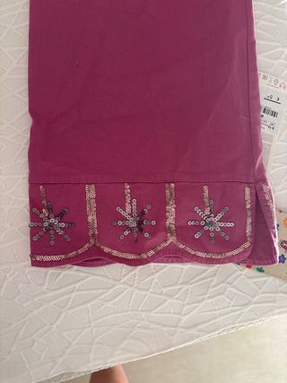 Pantalón fucsia XS-S con detalles
tienda de pueblo