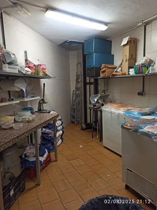 Asador de carnes a la brasa y pizzería de leña