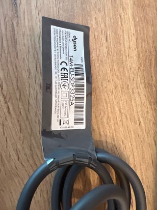 Secador Dyson gris-dorado