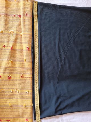 Blusa nera con maniche trasparenti dettagli blu