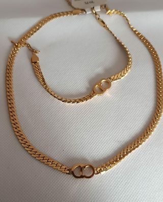 Collar y pulsera Dior dorados